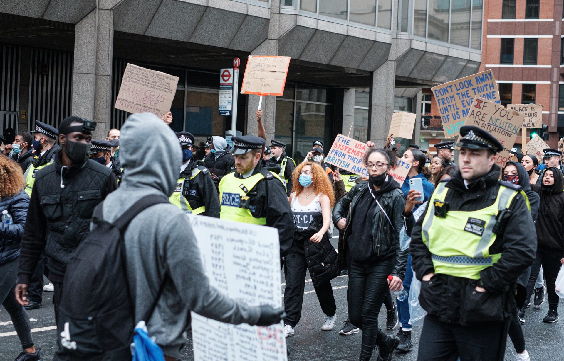 group of people in the streets protesting racism
